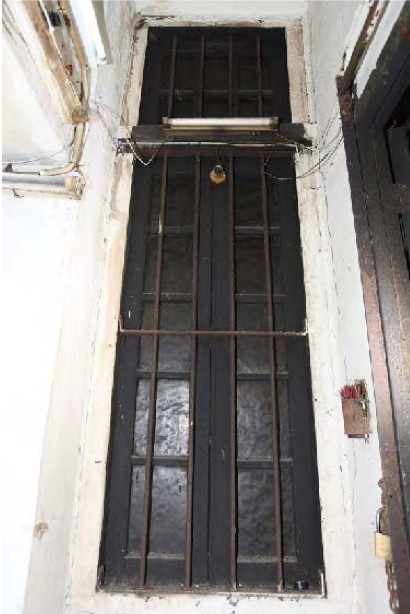 Photo showing a wooden window installed on a staircase taken in 2015.